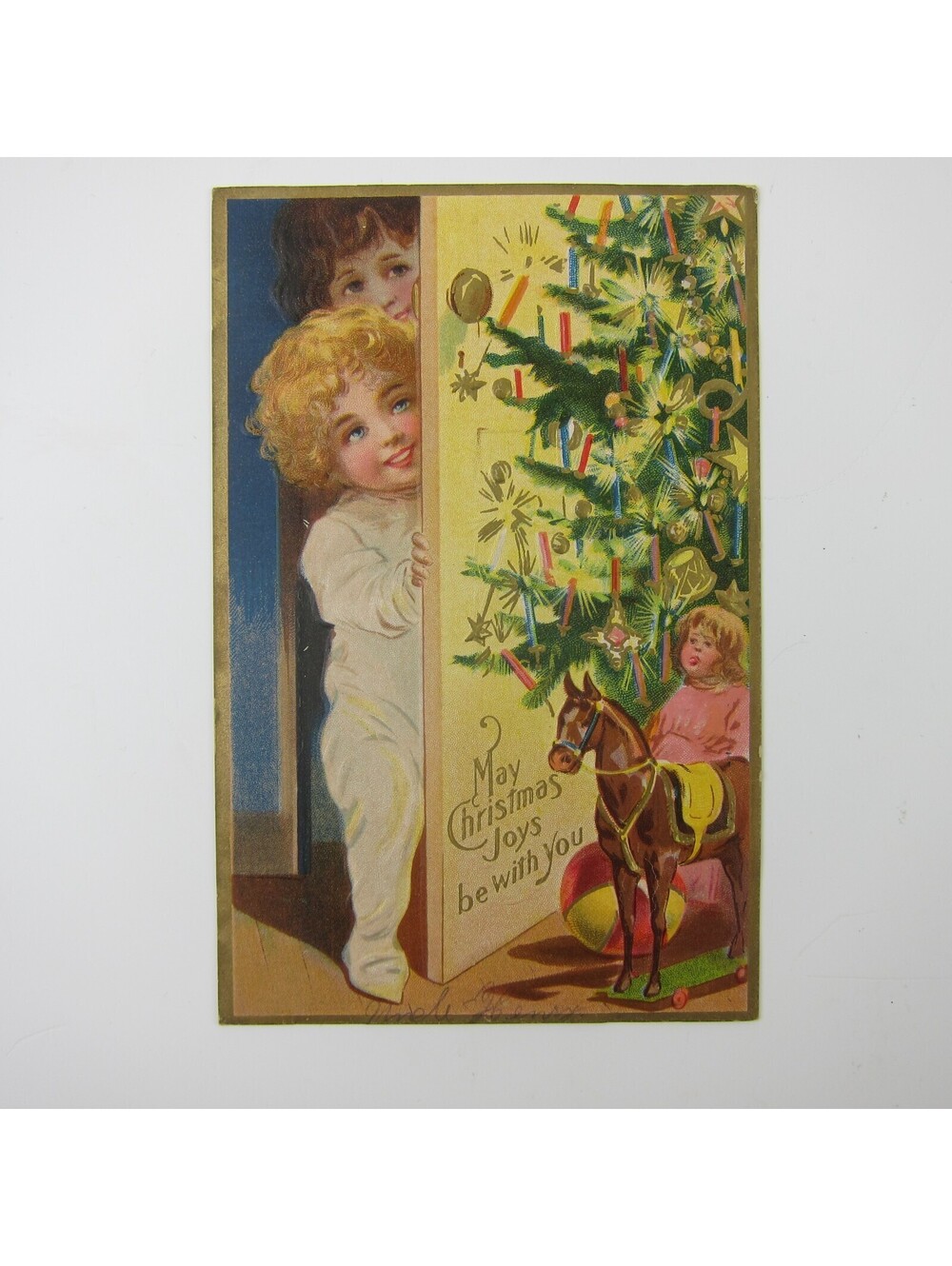 Christmas Postcard Children Behind Door Tree Candles Toys Gold Embossed Antique